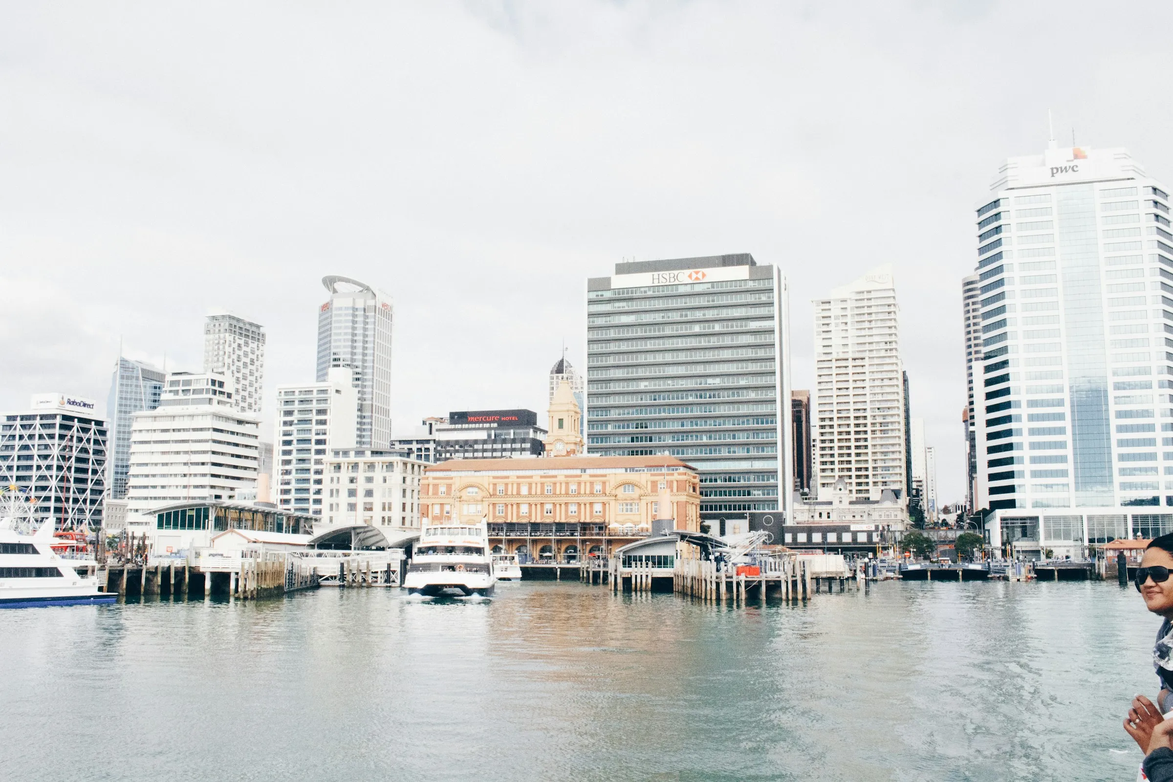 Auckland's waterfront with the historic Ferry Building and CBD towers