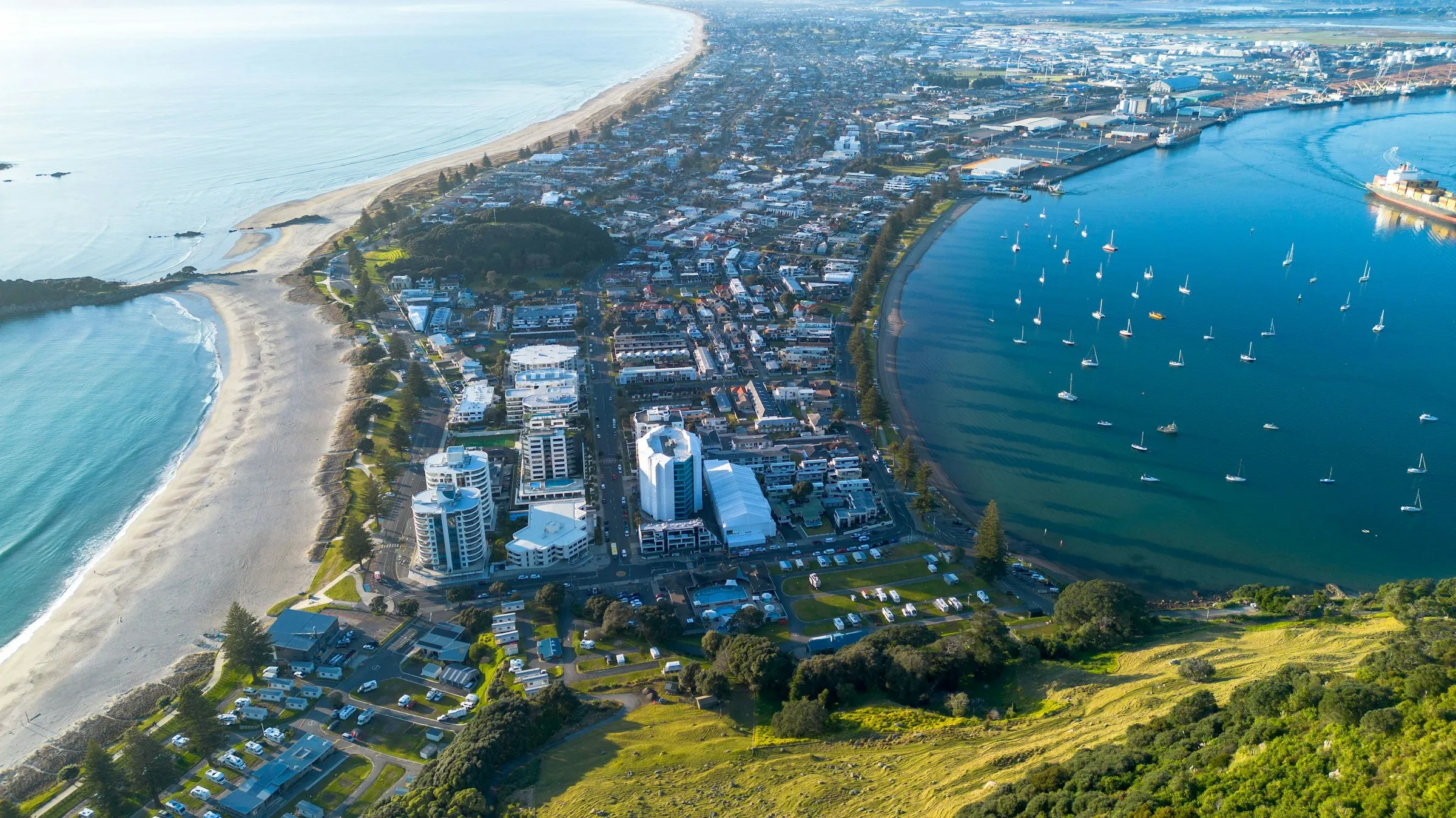 Aerial view of Mount Maunganui and Tauranga on a sunny day