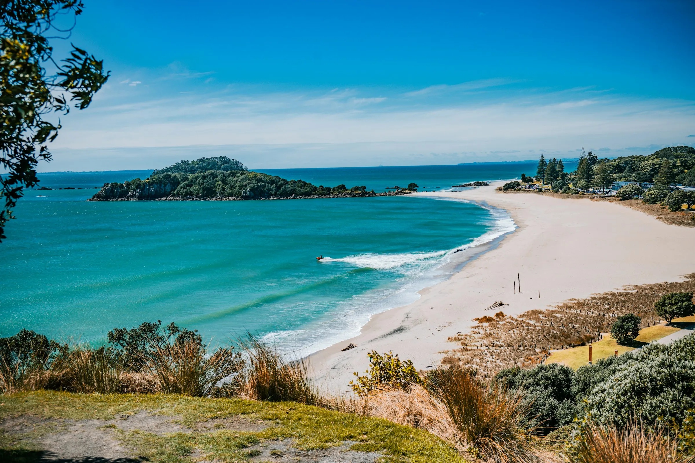 Mount Maunganui beach and turquoise water on a sunny day