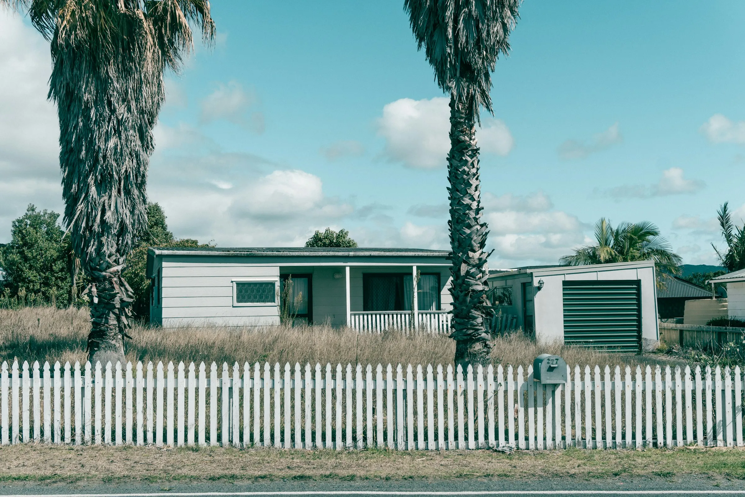 A classic New Zealand weatherboard bungalow in the sun